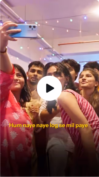 Ganesh Chaturthi, ADY Patil University — Group of young people smiling and taking a selfie indoors with hanging lights.